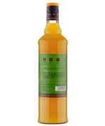 Back view of a tall glass bottle with a green label and yellow liquid, ideal for drinks or cocktails.