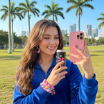 img-berry-coconut-rush-female-smiling-holding-moxy-can