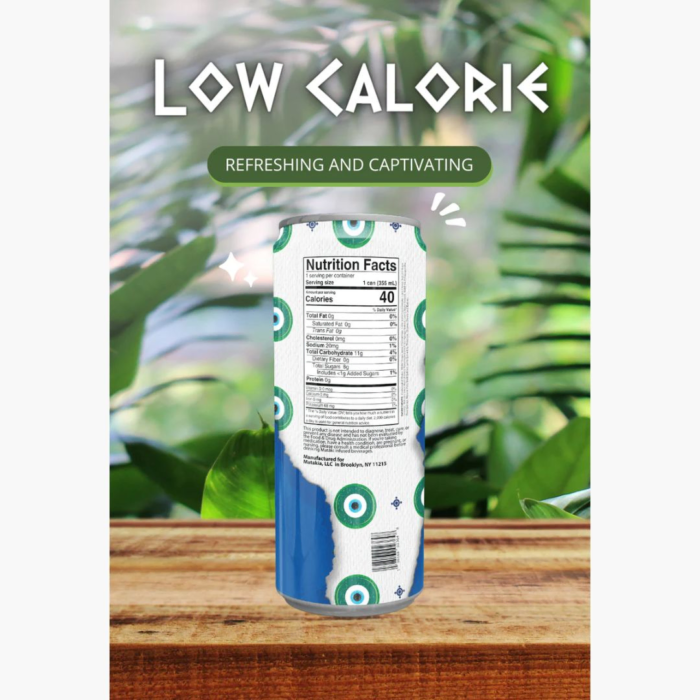 Low-calorie drink can with nutrition facts, placed on a wooden surface with lush green tropical leaves.