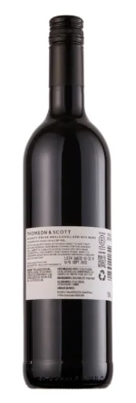 Back label of a red wine bottle displaying detailed product information and certifications.